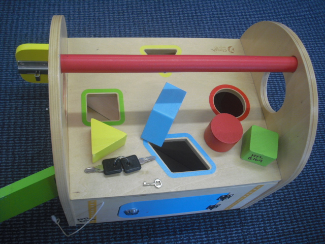 Wooden Box with Keys, Locks and Shapes