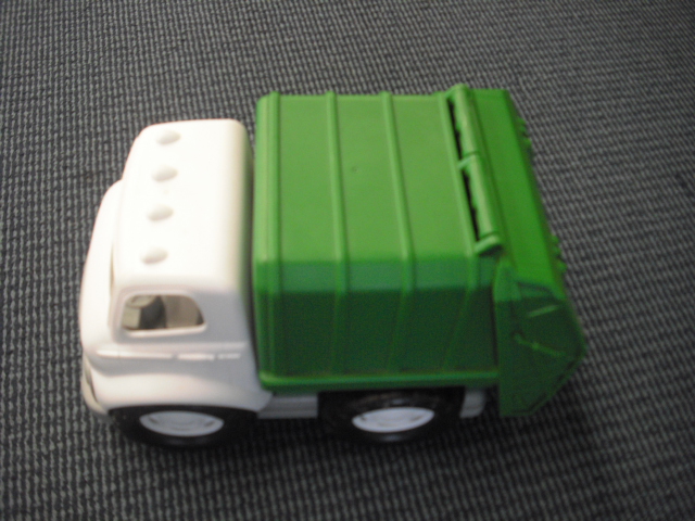 Green rubbish truck
